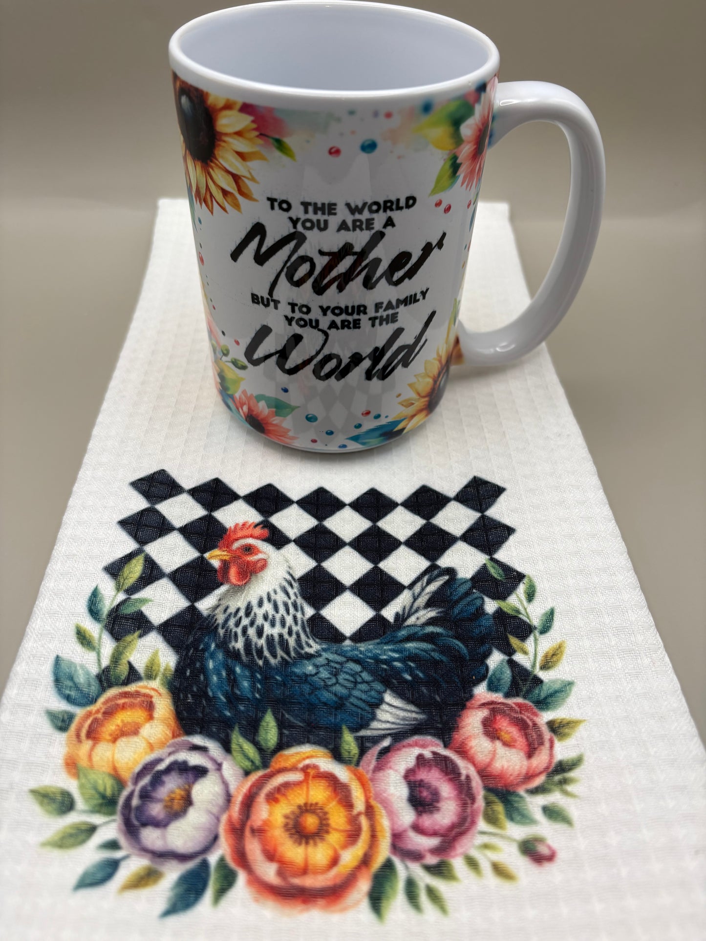 "Custom 100% polyester kitchen towel with full-color sublimation design, flat lay on grey background"