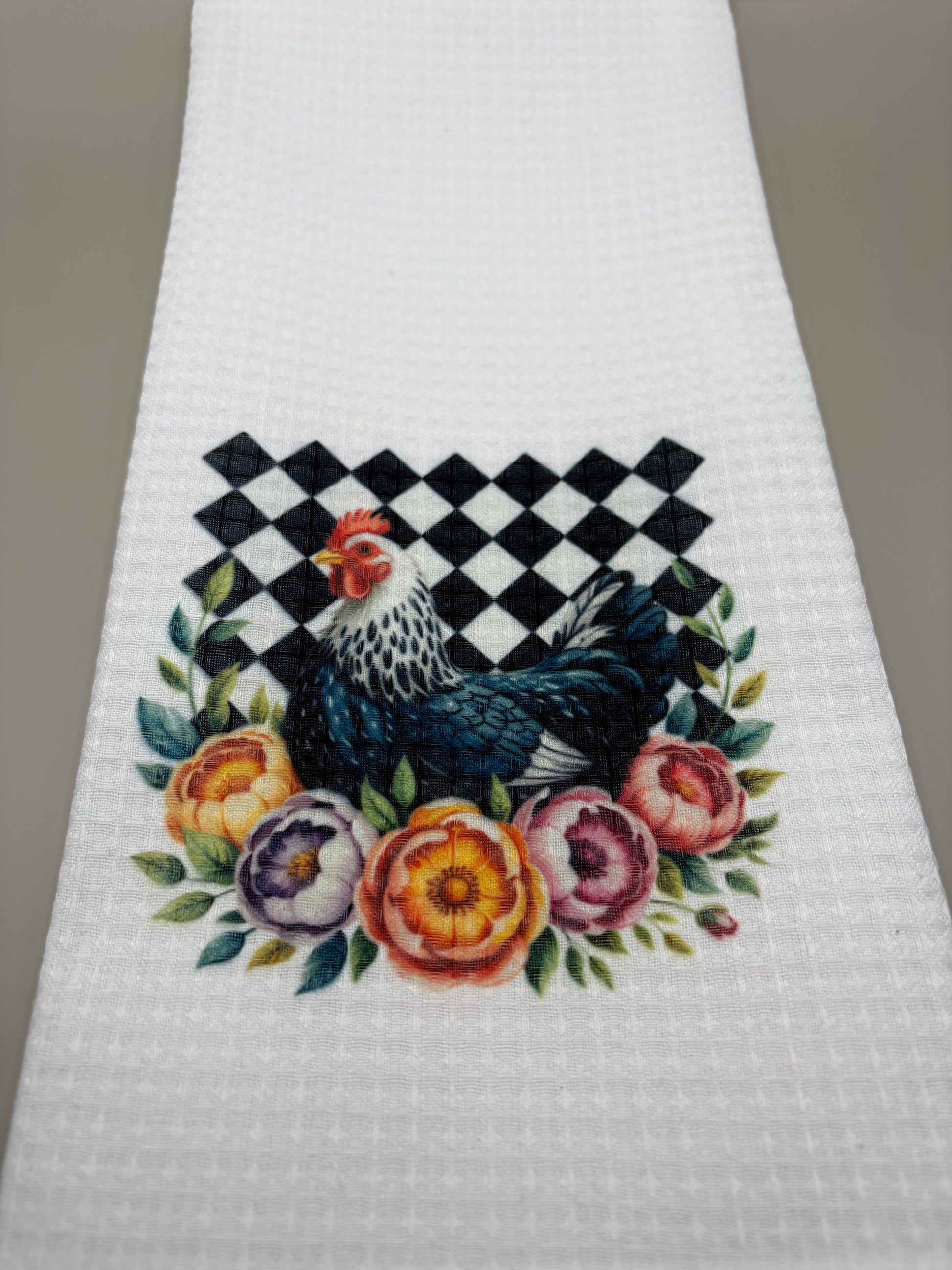 "Premade sublimation kitchen towel with vibrant design, 